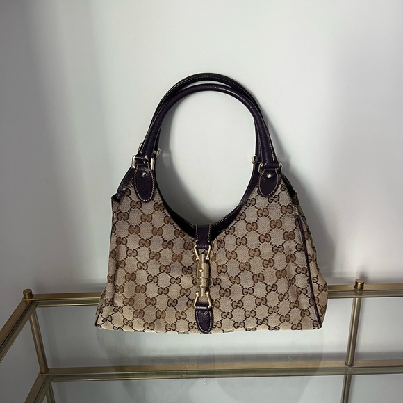 Gucci Handbags - Gucci Brown Monogram Canvas Shoulder Bag with purple Leather Trim